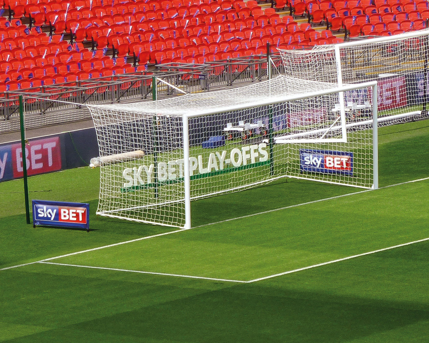 two Pitch Poppers next to soccer goal